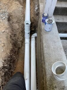 French drain and drain tile installation along a residential foundation in Vancouver, BC.