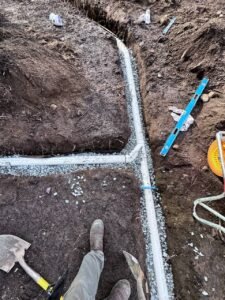PVC drain tile installation in Vancouver, BC for residential foundation drainage.