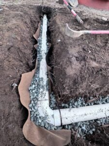 PVC drain tile installation in Vancouver, BC to improve foundation drainage.