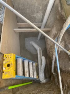 Cleanout pipes installed for a residential perimeter drainage system in Vancouver, BC.