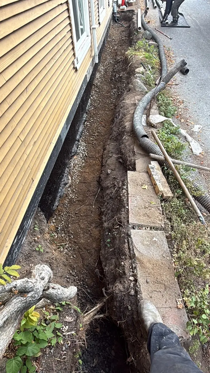 Excavated perimeter drainage beside a Greater Vancouver property