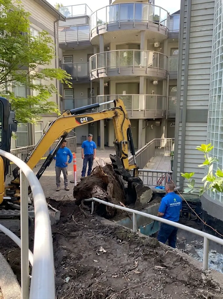 Exterior excavation beside a foundation for waterproofing work in Greater Vancouver