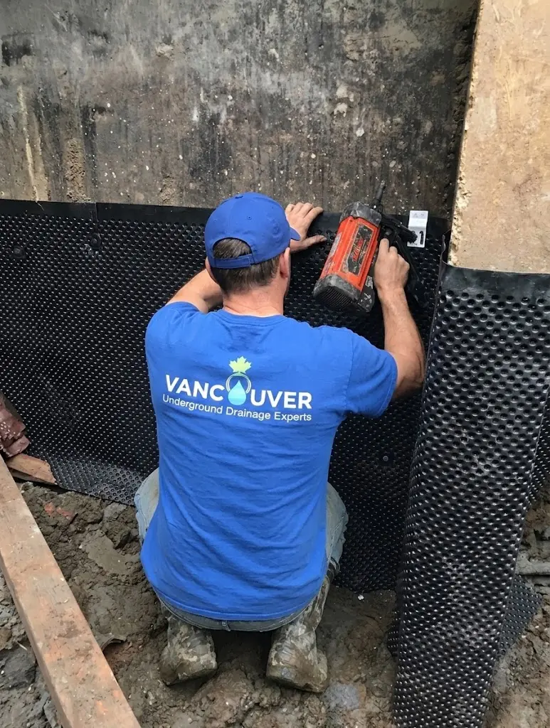 Foundation waterproofing membrane installed on an exterior foundation wall in Vancouver