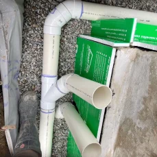 Basement perimeter drain system helping keep foundations dry and protected
