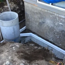 Clearing a clogged storm drain to restore proper water flow