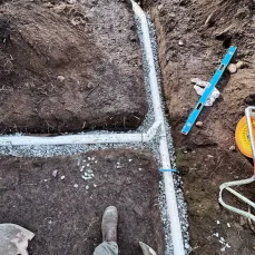 Camera inspection of a perimeter drain system to identify drainage issues